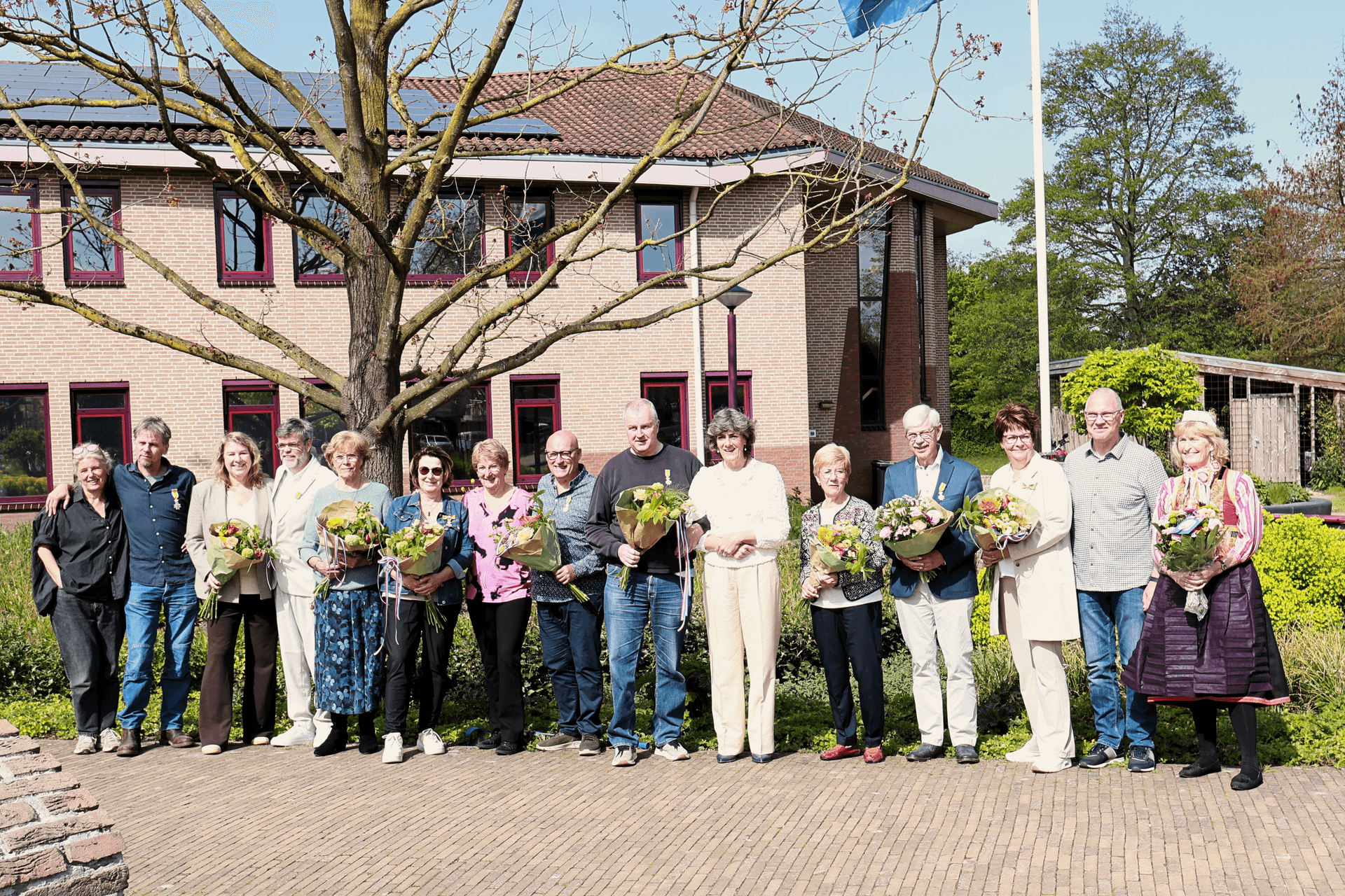 Groepsfoto met familie lintjesregen 2026